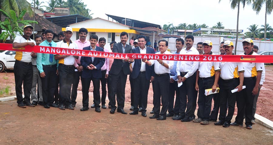 mr-sudarshan-holla-mr-sameer-cutting-ribbon