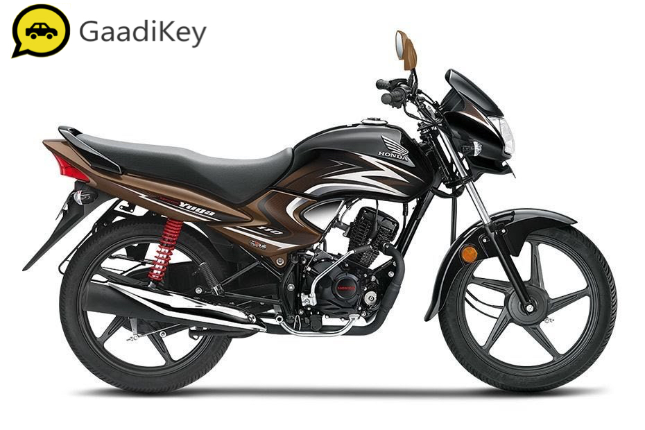 2019 Honda Dream Yuga in Black with Sunset Brown Metallic color