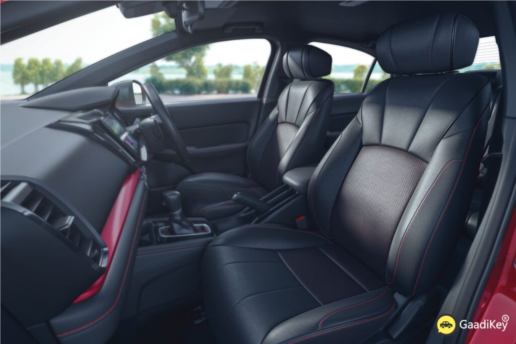 2025 Honda City Sport door panel detail with premium soft-touch materials and red accents