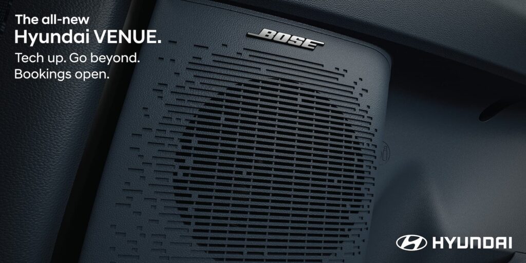 Close-up of the Bose speaker grille inside the all-new Hyundai Venue, showcasing the premium 8-speaker sound system.