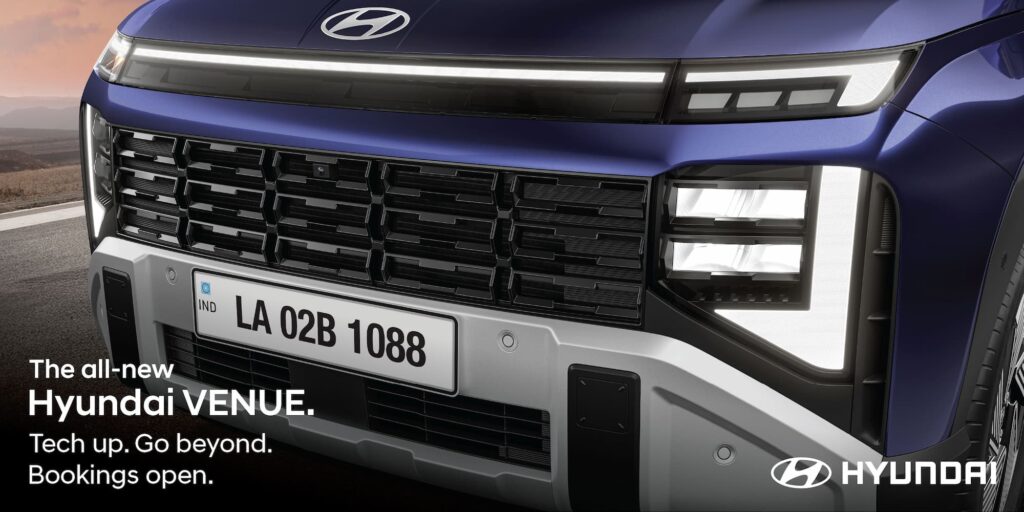 Close-up of the Dark Chrome Radiator Grille and Horizon LED positioning lamp on the all-new 2025 Hyundai Venue ----- New Stylish Grille  - Front view of the all-new 2025 Hyundai Venue in Mystic Sapphire blue