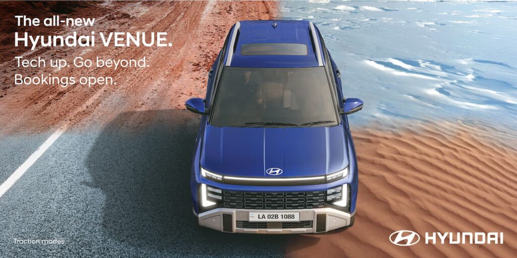 Top-down view of the all-new 2025 Hyundai Venue, illustrating its capability with Traction Modes for different terrains like road, sand, and snow.